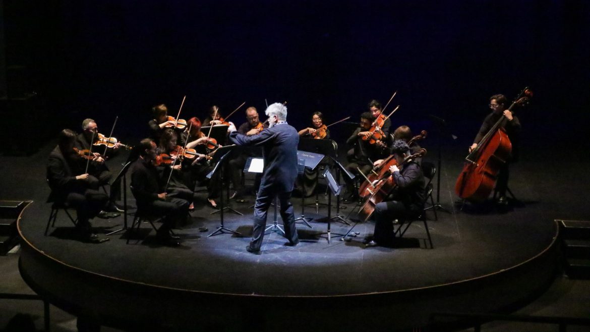 Las Vegas Sinfonietta string orchestra performing on stage